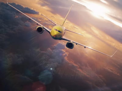 Fototapete Flugzeug bei Sonnenuntergang