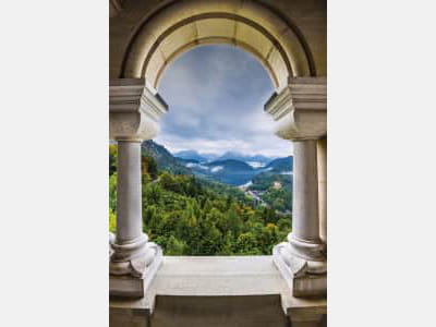 Fototapete Bergblick durch den Bogen