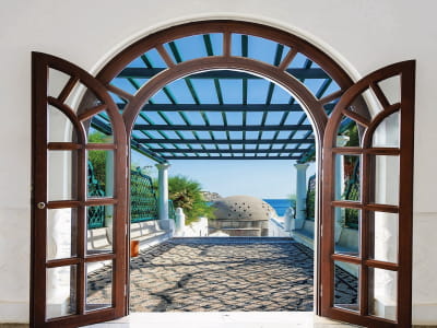 Fototapete Haus auf einer sonnigen Insel