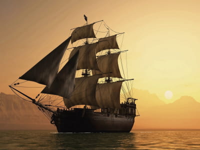 Fototapete Schiff vor Sonnenuntergang im Hintergrund