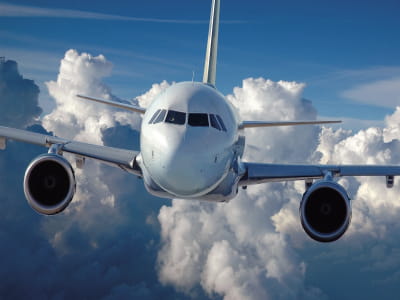 Fototapete Flugzeug in den Wolken