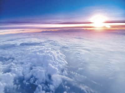 Fototapete Sonne über den Wolken