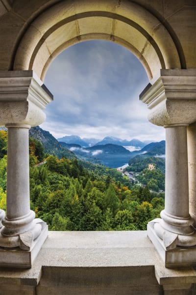 Fototapeta Bergblick durch den Bogen