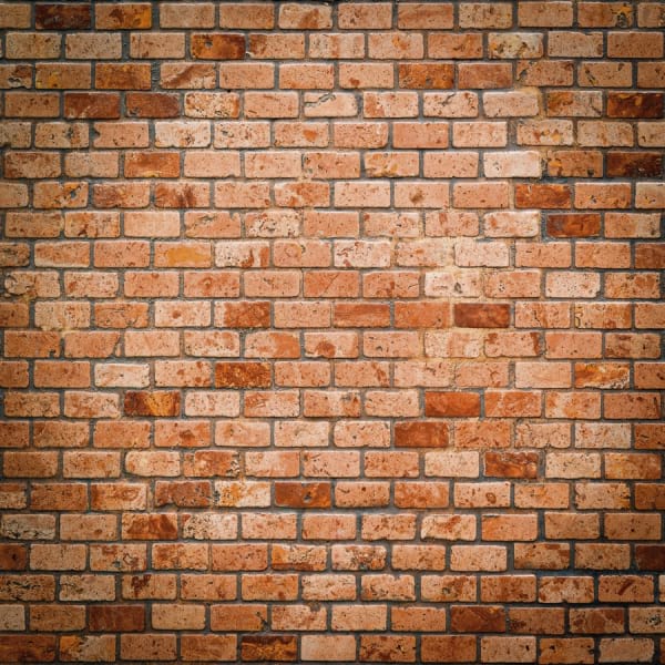 Fototapeta Orangefarbener Ziegelstein