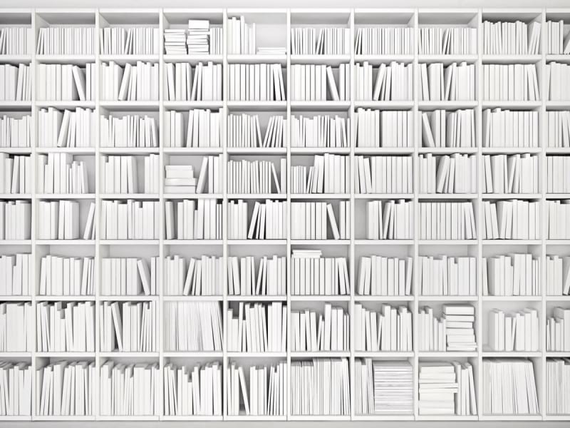 Fototapeta Regale mit weißen Büchern