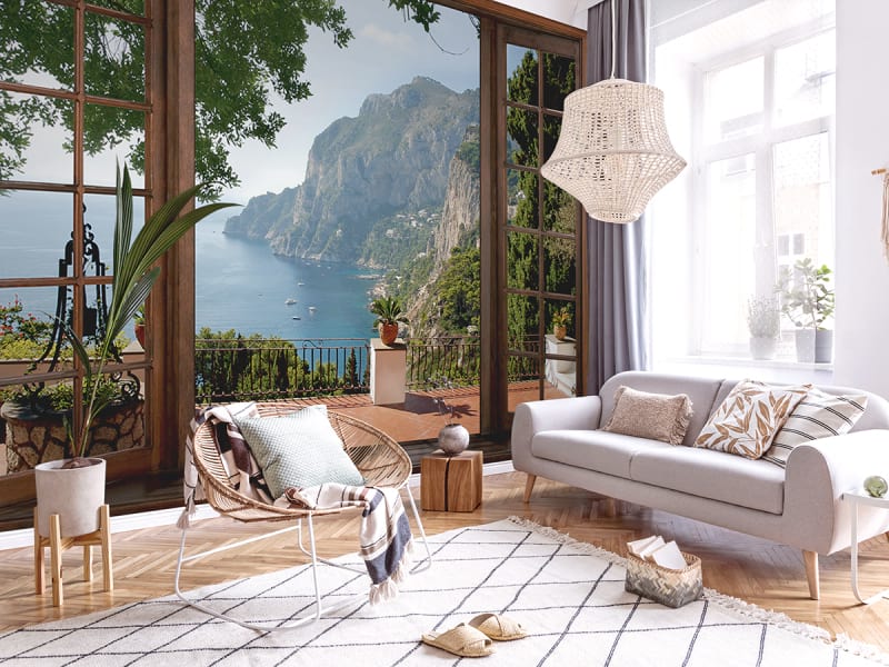 Fototapeta Fenster mit Blick auf die Natur we wnętrzu salonu