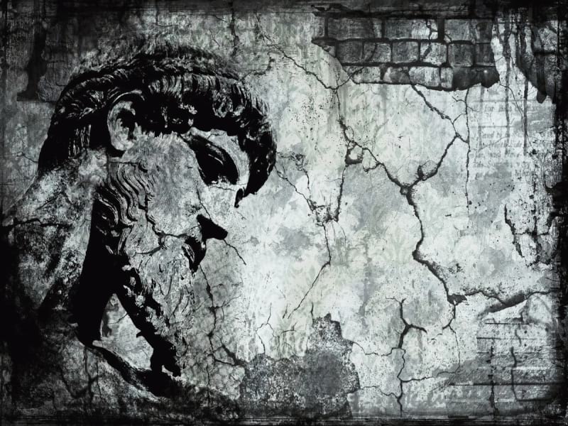 Fototapeta Porträt auf einer alten Mauer