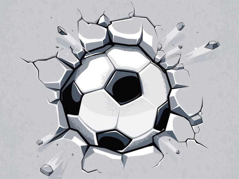 Fototapeta Kraftvoller Kick des Fußballs