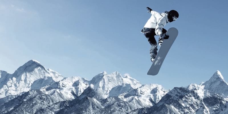Fototapeta Snowboarder in den Bergen
