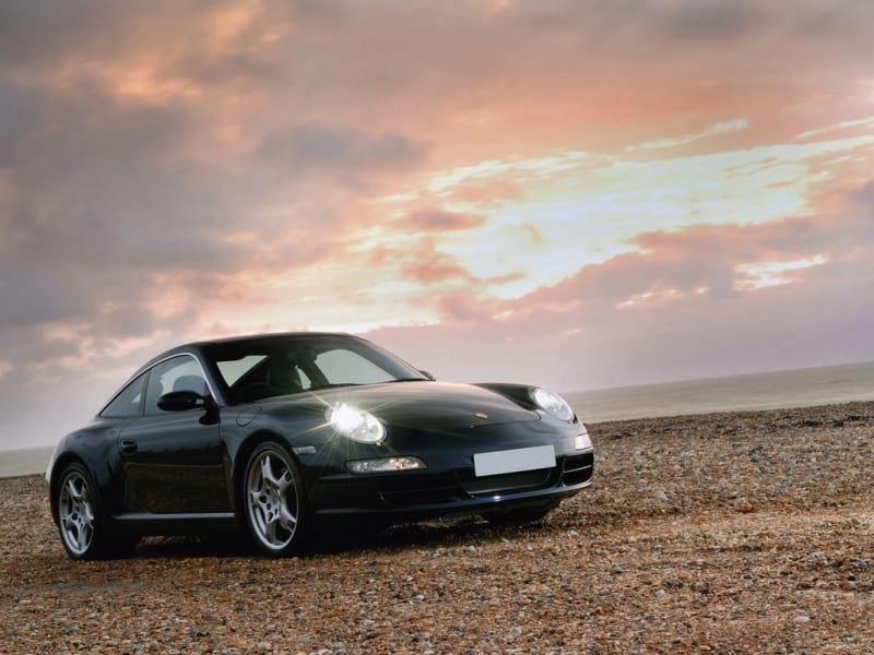 Fototapeta Porsche vor Sonnenuntergang