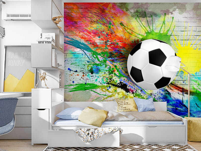 Fototapeta Fußball und Farben we wnętrzu pokoju nastolatka