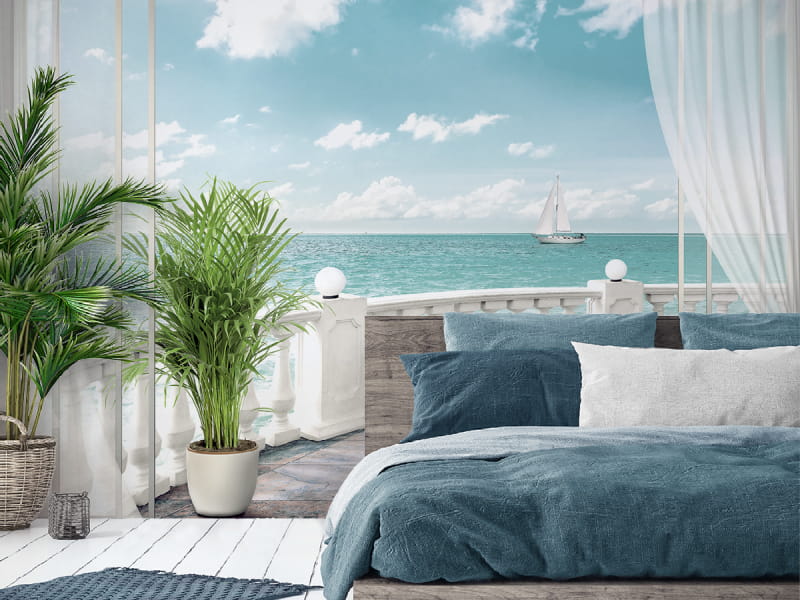 Fototapeta Fenster mit Blick auf das Meer we wnętrzu sypialni