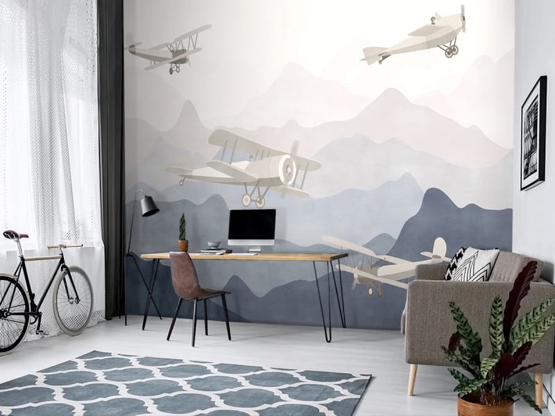 Fototapeta Flugzeuge über den Bergen we wnętrzu pokoju nastolatka