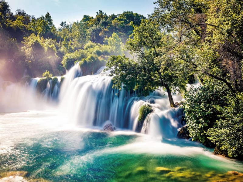 Fototapeta Sonniger Wasserfall