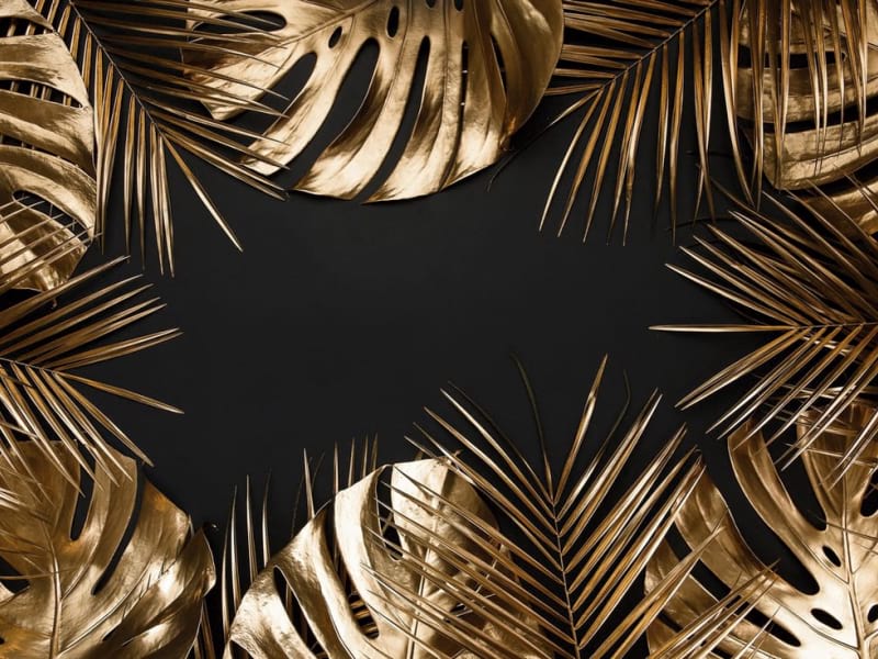 Fototapeta Goldene Blätter auf schwarzem Hintergrund