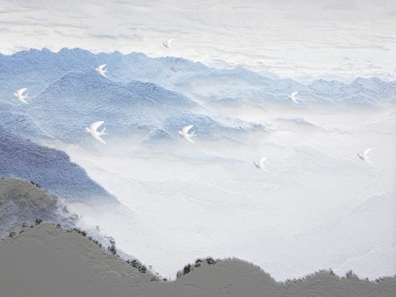 Fototapeta Weiße Vögel über den Bergen