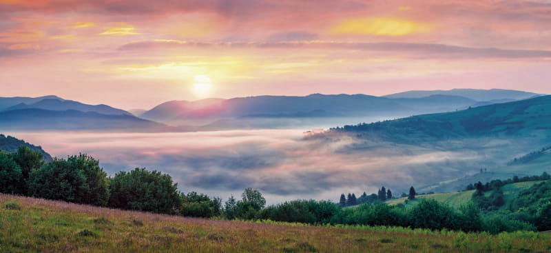 Fototapeta Sonnenaufgang in den Bergen