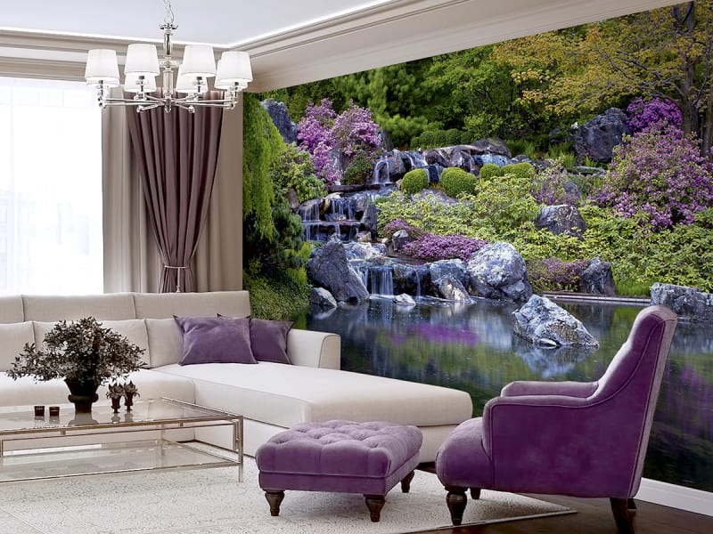 Fototapeta Wasserfall in einem blühenden Garten we wnętrzu salonu