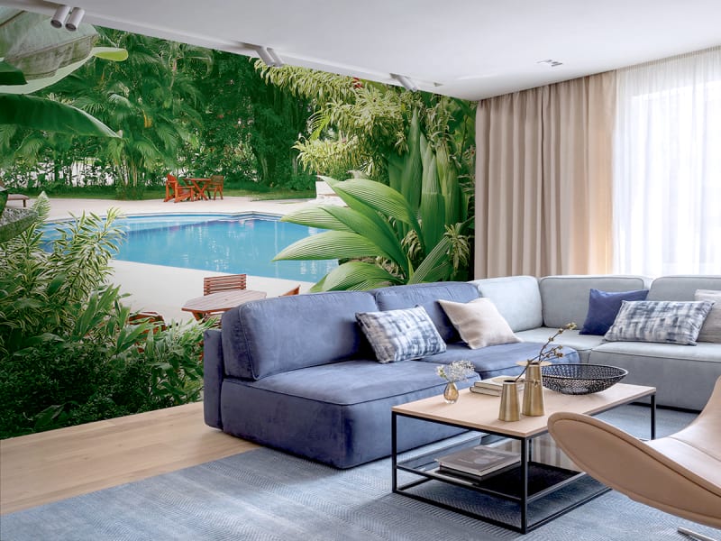 Fototapeta Schwimmbad in einem tropischen Garten we wnętrzu salonu