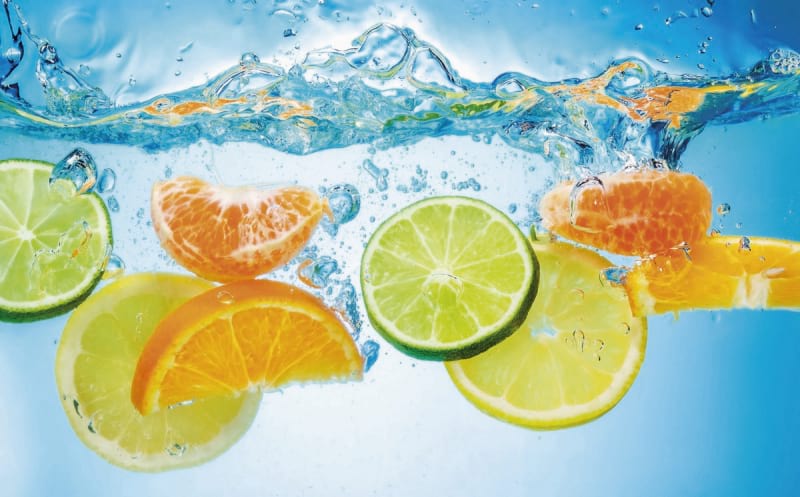 Fototapeta Zitrusfrüchte im Wasser