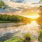 Miniatura fototapety Sonnenuntergang über dem Fluss