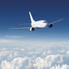 Miniatura fototapety Flugzeug über weißen Wolken
