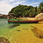 Miniatura fototapety Boot an einem tropischen Strand