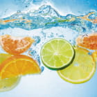 Miniatura fototapety Zitrusfrüchte im Wasser