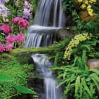 Miniatura fototapety Künstlicher Wasserfall im Garten